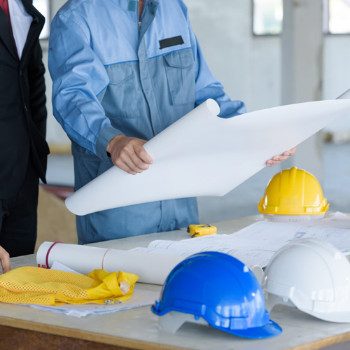 Engineer looking at plans